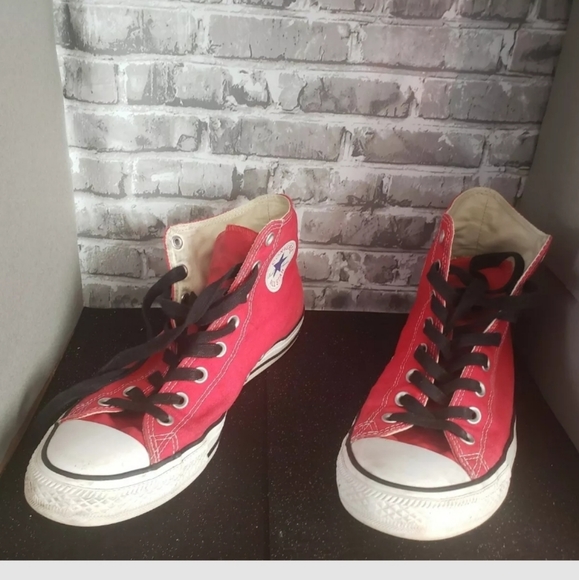 Perfectly broken in Red Converse High Tops